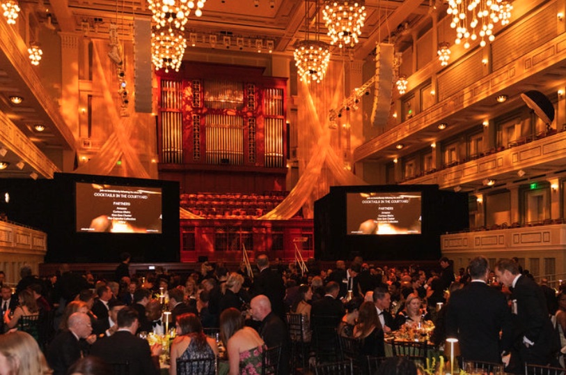 Guests at tables under the chandeliers of the Schermerhorn Symphony Center during the NEXT Awards
